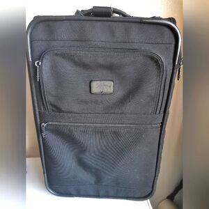 TUMI Checked Luggage